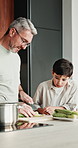 Dad, vegetables and cutting with child in kitchen for meal prep, healthy diet or cooking lunch. Father, kid or son learning with natural organic ingredients for culinary lesson or hospitality in home