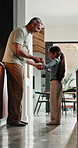 Dancing, smile and father with girl in kitchen, support and family bonding for healthy relationship. Holding hands, happy man and child with music for fun, spin practice and moving together in home