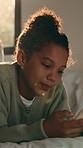 Relax, kid and scroll with phone on bed for internet search, status update and weekend break. Smile, girl child and mobile app in bedroom for watching online videos, message platform or chat in home