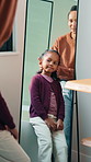 Mom, child or grooming with hair in mirror for morning preparation, styling or beauty in home. Mother, hug or helping kid with hairstyle, gratitude or thank you for support, love or care in house