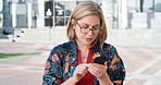 Business, woman and typing with phone in city for travel, schedule update and social media. Serious, female person and morning commute with mobile, browsing website and notification for text message