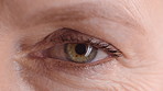 Eye, face and wellness with mature person for optometry exam, eyesight vision and myopia test. Closeup, ophthalmology and ocular care with contact lens, optical assessment and portrait for health