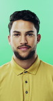 Face, business and man with smile in studio for career pride, about us and journalist intern. Portrait, person or news reporter with ambition, copywriter internship and experience on green background