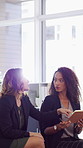 Meeting, talk and business people in office with notebook, reminder and strategy for public relations. Flare, women and schedule in pr agency with diary, collaboration and planning for press release.