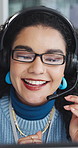 Computer, headset and support with happy woman in call center for conversation, help or solution. Assistance, contact us and glasses with agent in office for consulting, crm or customer service