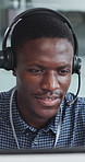 Computer, headset and support with black man in call center for advice, consulting or feedback. Assistance, contact us and solution with agent in office for communication, crm or customer service