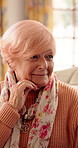 Thinking, senior woman and sad at house with grief, loneliness and emotional expression. Thoughts, reflection and elderly person with depression, mourning loss and unhappy with dementia condition
