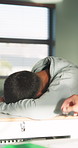 Student, sleeping and education in classroom, tired and teenager with burnout on desk or low energy. Learner, wake up and bored by lesson in high school, knowledge and person with academic fatigue