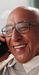 Laughing, phone call and senior man in home, online communication and contact for weekend networking. Discussion, funny story and elderly person with mobile for connection, humor and happy for chat