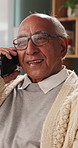 Talking, phone call and senior man in home, online communication and smile for weekend networking. Discussion, share news and elderly person with mobile in lounge, connection and happy for contact