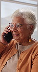 Talking, phone call and senior woman in home, online communication and smile for weekend networking. Discussion, share news and elderly person with mobile in lounge, connection and happy for contact