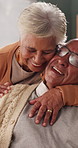 Smile, hug and old couple in living room with love, connection and bonding together for retirement. Happy, elderly people talk and embrace in home with marriage commitment, soulmate and relationship.