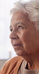Regret, retirement and thinking with senior woman in home living room for reflection or nostalgia. Memories, perspective and sadness with old person in apartment for contemplation, ideas or remember