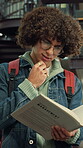 Student, education and man with book in library, thinking and planning for test and academic growth. College, reflection and person with textbook for knowledge, smile and exam preparation with info