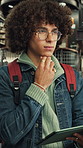 Man, student or thinking with tablet in library for university assignment, knowledge or research. Male person, academic learner or contemplating with technology for project, study topic or assessment