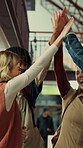 Education, funny and high five with friends at school together for motivation or team building. Laughing, learning and success with group of student people at college or university for study goals
