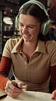 Headphones, laughing and writing with student woman in library for education, learning or study. Laptop, music and notebook with funny person at college or university for development or knowledge