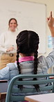 Question, education and child in classroom at school for learning, knowledge or studying. Smart, raised arm and student with answer for test, assessment or quiz with teacher for support and teaching