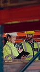 Tablet, talking and supply chain employees in warehouse with inventory, stock or delivery approval. Digital technology, discussion and logistics managers with online order confirmation for shipping.