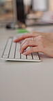 Hands, keyboard and typing with business person at desk in office for feedback, planning or research. Computer, fingers and report with employee in workplace for administration, development or review