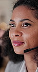 Woman, consultant and talking with headset in call center for online advice or customer service. Female person, agent or speaking with mic for virtual assistance, web support or help in workplace