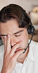 Stress, tired or man with headset in call center, exhausted or consulting burnout for customer service. Overwhelmed, tech support or agent with fatigue for problem solving, hotline crisis or mistake