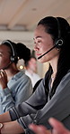 Talking, people or woman with headset in call center, troubleshooting advice or customer care at night. Tech support, late hotline or agent with explanation for solution, contact or online help desk