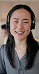 Face, consultant or night of happy woman with headset in call center for customer service. Portrait, female person or friendly agent working late with smile or mic for virtual assistance in workplace