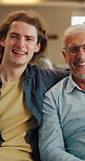 Son, face and senior dad on sofa with love, hug and happy for bonding together in home. Family, relaxed and adult man with father for support, connection and portrait on weekend or holiday on couch