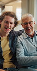 Son, face and old dad on sofa with laughing, love and hug for bonding together in home. Family, funny and happy man with senior father for social connection and portrait on weekend or holiday
