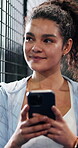 Fitness, online and woman with phone on tennis court, thinking or communication with contact on web. Athlete, laugh and happy person with mobile for chat, reflection and reading funny message on app