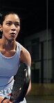 Sports, padel and woman with racket on court, concentration and fitness training for coordination. Workout, tennis gear and player with practice game for skill development, active and swing for ball
