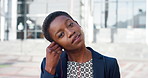 Business, face and woman with earphones in city for morning commute, music playlist and smile. Professional, black person and streaming podcast in urban town for work travel, job confidence and audio