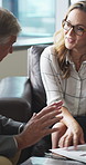 Documents, discussion and business people in office for negotiation, contract or finance report. Meeting, paperwork and financial manager with investor client for investment proposal in workplace.