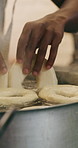 Chef, hands and dough in kitchen with bagels, restaurant hospitality and boiling starch in water. Baker, person and cooking with pot for bread roll, meal prep and gluten free recipe in small business