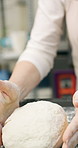 Bread, dough and hands of person in kitchen for flour ingredients, bakery and small business. Cooking, pastry chef and restaurant catering with baker in cafe for sourdough prep and hospitality