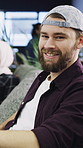 Face, creative and man with smile in office for career pride, about us and journalist. Portrait, male person and coworking with ambition, positive attitude and advertising copywriter at media company