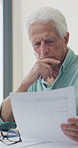 Thinking, glasses and old man with stress for paperwork, financial anxiety and retirement plan problem. Review policy, worry or senior person with insight for annuity value, eyewear or laptop in home