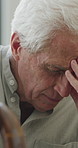 Headache, senior man and cane with stress for fibromyalgia, muscle tension or anxiety in home. Male person, elderly patient or discomfort with walking stick or migraine for hypertension in house