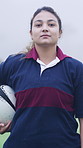 Face, rugby and woman at field for sports, game training and confidence for wellness on pitch. Portrait, proud player and athlete with ball outdoor for exercise, health and dedication with fitness