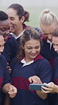 Discussion, rugby team or people with mobile, check field position or funny practice video for laughing. High five, outdoor and happy women with phone for match day planning, joke and sports chat