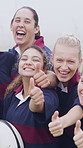 Face, team and thumbs up on field with sports practice, smile or accomplishment for training together. Happy, women hug and outdoor with group diversity, like emoji or teamwork for rugby achievement.