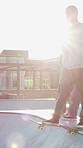 Group, ramp and action with skateboard for fitness, extreme sports and practice with friends. Skateboarder, training and men at skatepark for competition, hobby and balance outdoor with lens flare