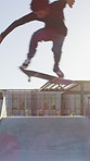 Teenager, skating and jump with skateboard at park for fitness, exercise and practice skills. Boy, skater and freestyle for sports performance, cardio training and extreme tricks for weekend activity