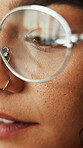Reading, glasses and woman working with vision, optometry or wellness in creative agency. Happiness, optical and marketer person in workplace for research with spectacles, eyecare or eyesight closeup