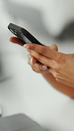 Woman, hands and typing in office with phone, business communication alert or draft email response. Person, browsing and scroll in agency with tech, mobile app and text message notification for work.