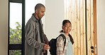 Backpack, doorway and dad with girl child in home, leaving together for school or work. Business, education or help with single parent man and daughter getting ready at entrance to apartment