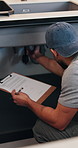 Checklist, plumber or man by sink in kitchen, pipeline maintenance or inspection for valve corrosion. Clipboard, back or handyman with repair report for filter system, writing evaluation or home