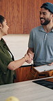 Handshake, plumber and woman in kitchen for service, installation and writing invoice. Happy, agreement and handyman shaking hands with client for thanks, contract or insurance for home repair