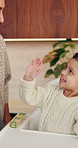 Dad, daughter and high five in home with smile, bonding together or motivation for child development. Happy, man and tickle girl kid in house with celebration, encouragement and support for growth.